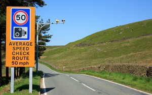 speed awareness course a roadside speed limit sign indicating a 50 mph average speed check is in operation 
