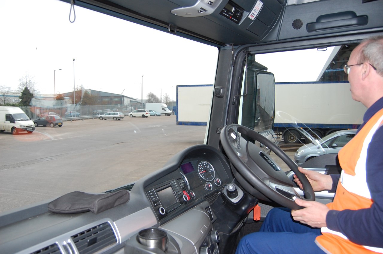a driver CPC course in vehicle training session in progress in a lorry cab