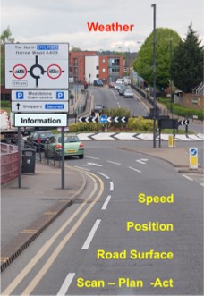 road_scene_approaching_a_roundabout_showing_advanced_driving_techniques