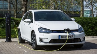 EV & hybrid driving course car being charged at a motorway service station